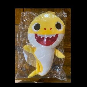 Singing “baby shark” stuffed animal